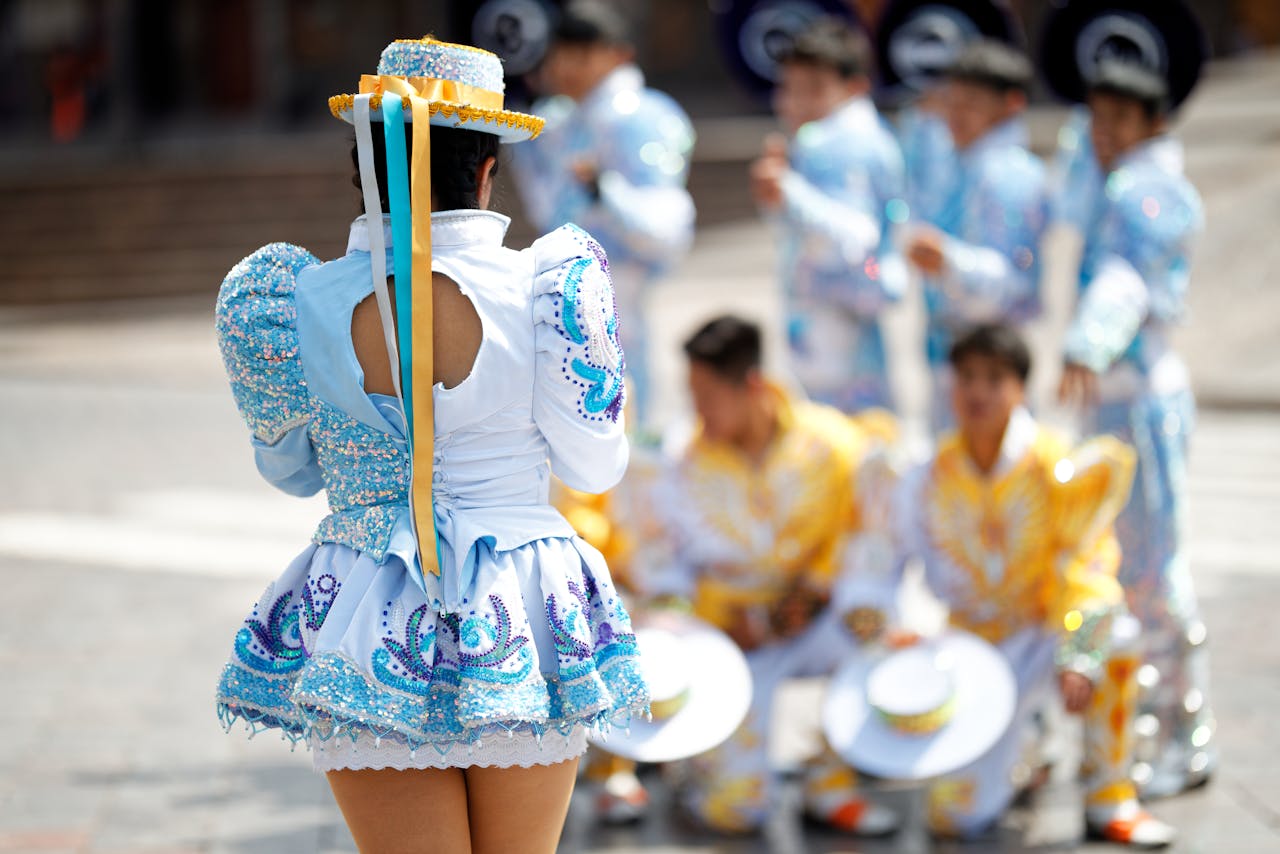 Vibrant cultural dance in Cusco with traditional costumes, showcasing Peruvian heritage.