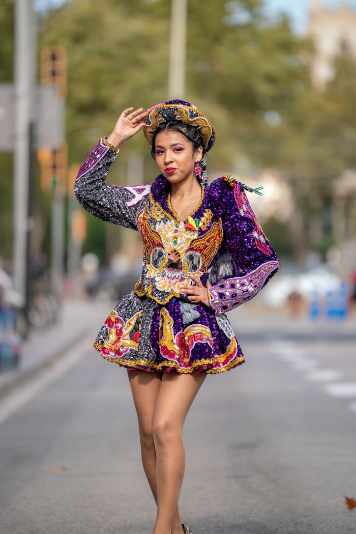 about-02 Portrait of a woman in vibrant traditional dance costume during street parade.